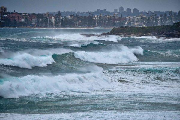 Newport Beach declares emergency as record tides flood Balboa Peninsula