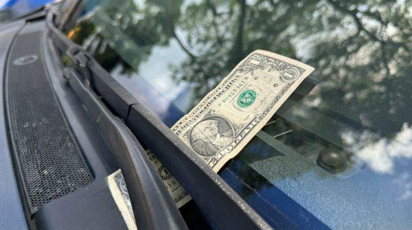 Windshield bill scam: how thieves target drivers in parking lots